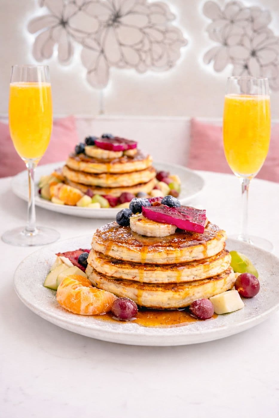 Pancakes with a mimosa cocktail